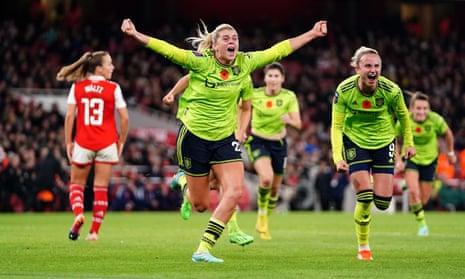 Alessia Russo celebrates scoring Manchester United's winning goal against Arsenal.