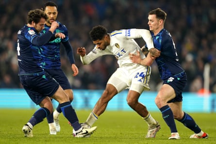 Georginio Rutter tries to battle past Stoke players