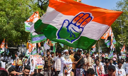 Supporters of the Indian National Congress party at a protest in New Delhi, 27 March this year, against the disqualification from parliament of main opposition leader, Rahul Gandhi.