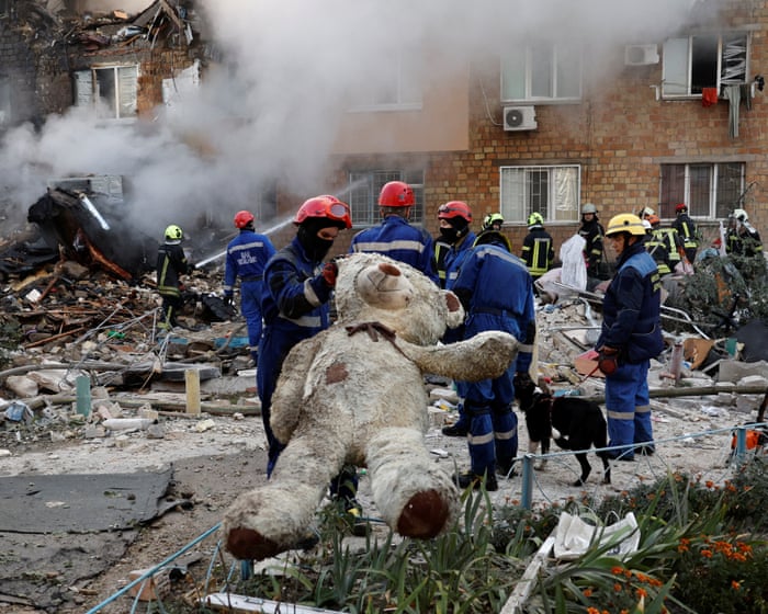 Children among those killed in Russian attack on Kyiv – video