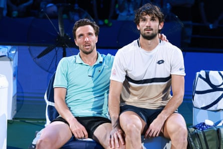 Arthur Rinderknech and his cousin Valentin Vacherot take in the moment after the Shanghai Masters final