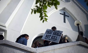People arrive for Sunday services at the Mother Emanuel AME church in Charleston, South Carolina after a shooting.