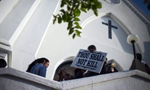 People arrive for Sunday services at the Mother Emanuel AME church in Charleston, South Carolina after a shooting.