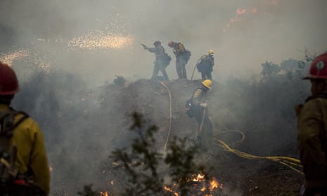 Firefighters Battle The Dolan Fire On California’s Big Sur Coastline<br>Firefighters light a controlled burn while fighting the Dolan Fire near Big Sur, California, U.S., on Sunday, Sept. 13, 2020. The wildfire burning in the rugged mountains of California’s Big Sur coastline has burned more than 117, 242 acres near Big Sur and is 40% contained, according to the U.S. Forest Service. Photographer: Nic Coury/Bloomberg via Getty Images