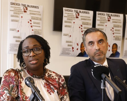 Bayoh’s sister Kadi Johnson and Aamer Anwar, the lawyer representing the family, at a press in Glasgow.