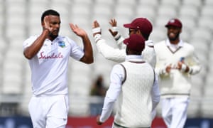 Shannon Gabriel celebrates taking the wicket of Jos Buttler.
