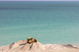 Federally funded imported sand is used as one of mitigation measures against climate change. This segment is at 67th st in Miami Beach.