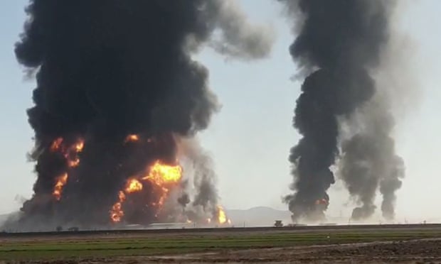 Fire and smoke rise from an explosion of a gas tanker in Herat, Afghanistan