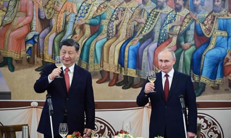 Xi Jinping and Vladimir Putin at a reception following their talks at the Kremlin, Moscow, 21 March 2023.