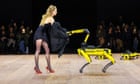 Models and robots share the runway at Coperni fashion show