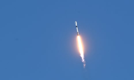A SpaceX rocket carrying 49 Starlink internet satellites heads skyward after launching at the Kennedy Space Center