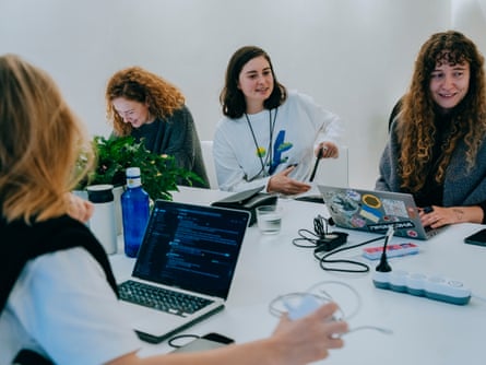 Olena Skyrta, centre, with her team, which consists mostly of women.
