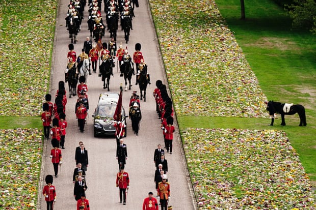 Emma, the Queen’s Fell pony, stands as the coffin arrives at Windsor Castle.