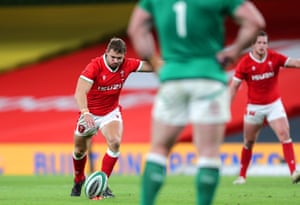 Wales’ Leigh Halfpenny kicks a penalty.