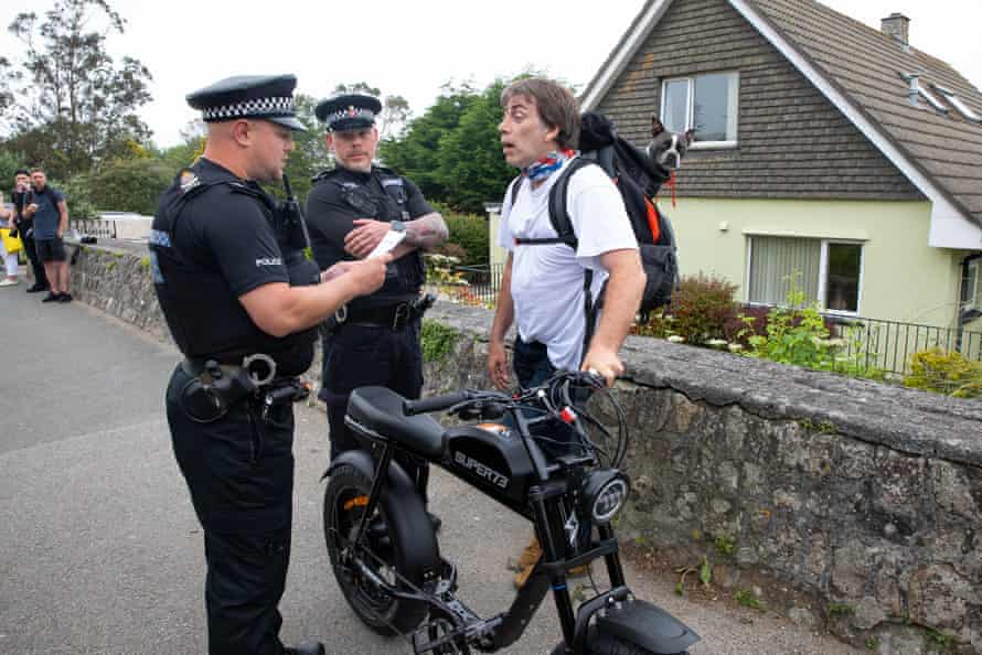 A man remonstrates with police over restrictions in Carbis Bay.