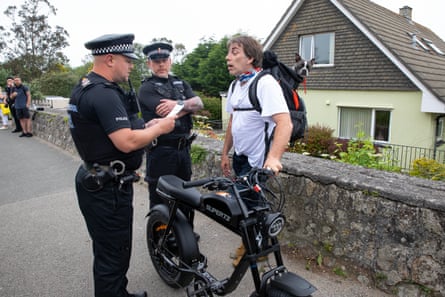A man remonstrates with police over restrictions in Carbis Bay.