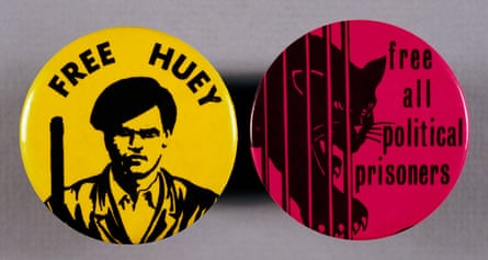 A air of Black Panther party buttons, one reading “Free Huey” in reference to Huey P Newton, co-founder of the party.