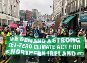 Banner reads: We demand net zero for Northern Ireland