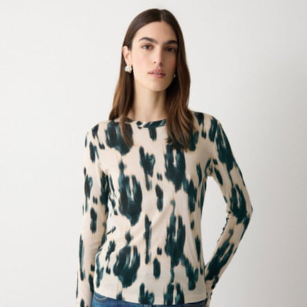 A model wears long-sleeve abstract print top from Jigsaw