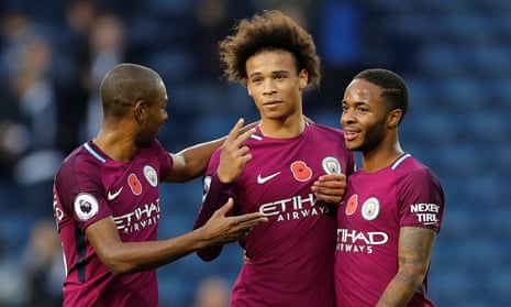 Manchester City’s three scorers – Fernandinho, Leroy Sané and Raheem Sterling – celebrate after 3-2 win at West Bromwich Albion