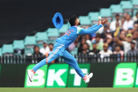 Shreyas Iyer of India dives to catch out Alex Carey