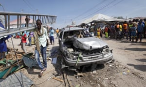 The aftermath of a blast in a market in Mogadishu in February which killed more than a dozen people.