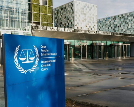 A sign for the International Criminal Court stands before the building in The Hague