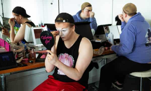 Lawrence Chaney (blue hoodie) and Ellie Diamond (in front), RuPaul’s Drag Race Drag Queens, prepare for a shoot in Glasgow, Scotland UK 01/03/2021
