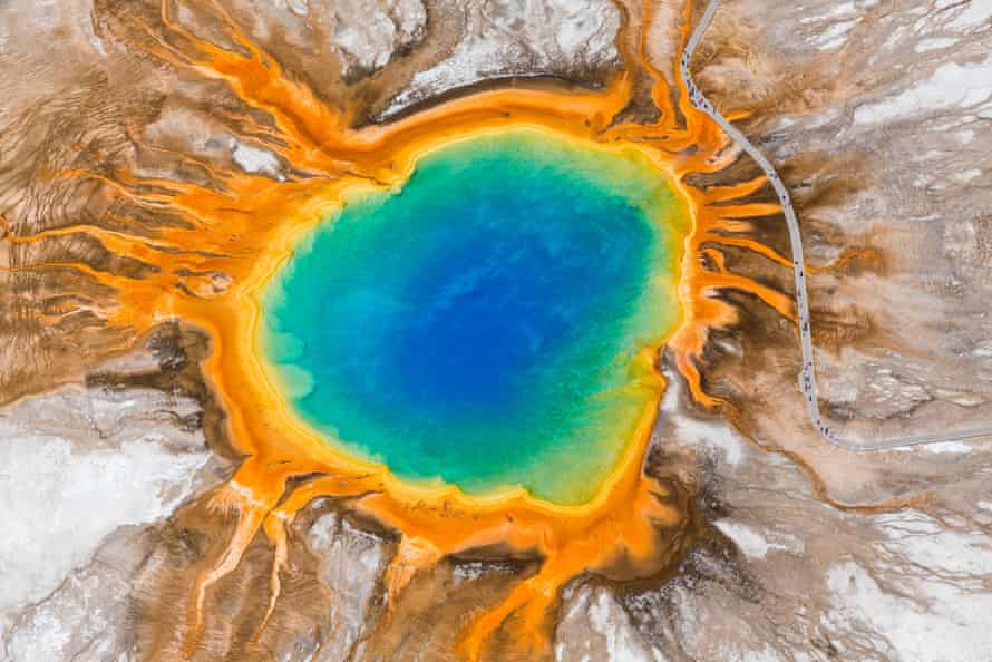 Yellowstone is home to 10,000 hydrothermal features which could be affected, including the Grand Prismatic Spring, pictured.