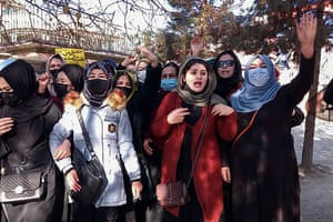 Afghan women chant slogans to protest against the ban on university education for women in Kabul