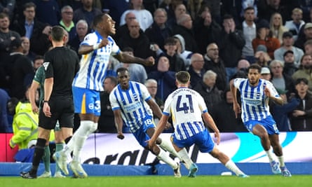 Danny Welbeck (centre left) celebrates after scoring Brighton’s third goal against Spurs.