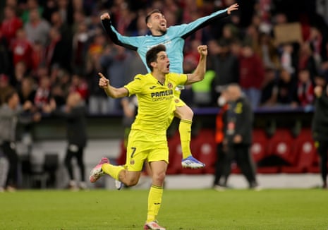 Gerard Moreno (front) and goalkeeper Geronimo Rulli (back) celebrate Villarreal’s victory.