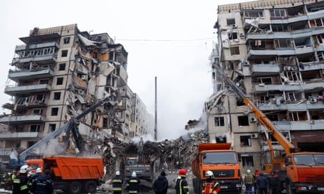 Aftermath of Dnipro apartment block destruction following missile strike