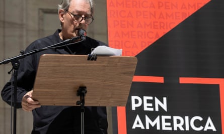 Paul Auster speaking during a reading event in solidarity of support for author Salman Rushdie outside the New York Public Library in 2022.