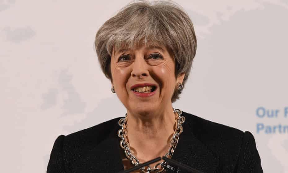 Theresa May grimaces as she delivers her watershed Brexit speech
