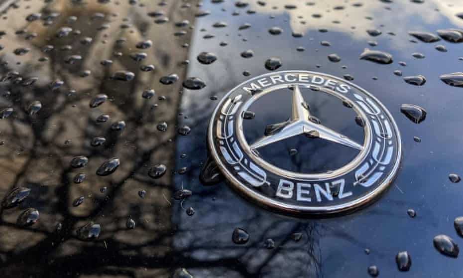 Bonnet of a Mercedes Benz car with its logo