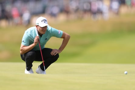 Rasmus Højgaard lines up a putt on the first green on his final round in The Open at Royal Portrush.