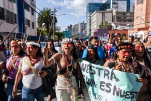 Nenquimo marching with Waorani people