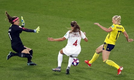 Stina Blackstenius, right, gets to the ball ahead of Canada goalkeeper Stephanie Labbe and Shelina Zadorsky to give Sweden the lead.
