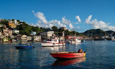 Fishing boats are anchored 28 January 2022 in the harbour of St George’s, Grenada