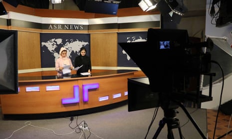 Afghan journalists work at ASR news in Herat, Afghanistan, in September 2020.