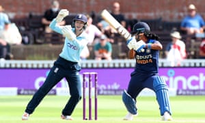 Shikha Pandey is caught out by England’s Amy Jones .