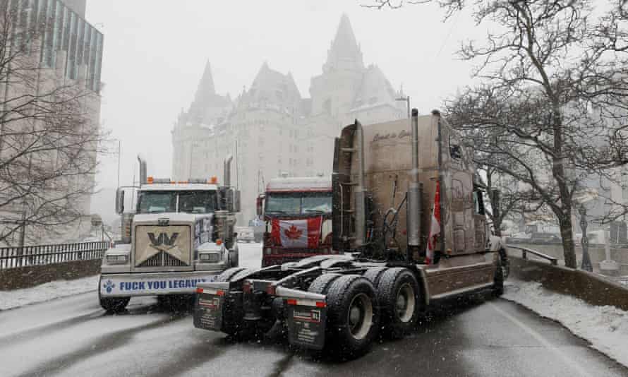 Lorries clog downtown streets as truckers and supporters continue to protest vaccine mandates, in Ottawa.