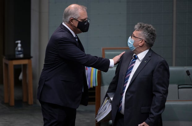 Scott Morrison greets the minister for resources and water, Keith Pitt, as he arrives for question time in the house of representatives of Parliament House last year.