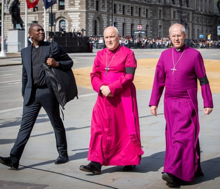 Justin Welby, the archbishop of Canterbury (right), arrives at Westminster Hall ahead of the royal family and the Queen’s coffin