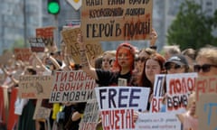 Ukrainians hold placards in downtown Kyiv reading 'Captivity is killing!', 'Don't be silent!', 'Free Azov' and other slogans during a rally calling for authorities to return their relatives from Russian captivity