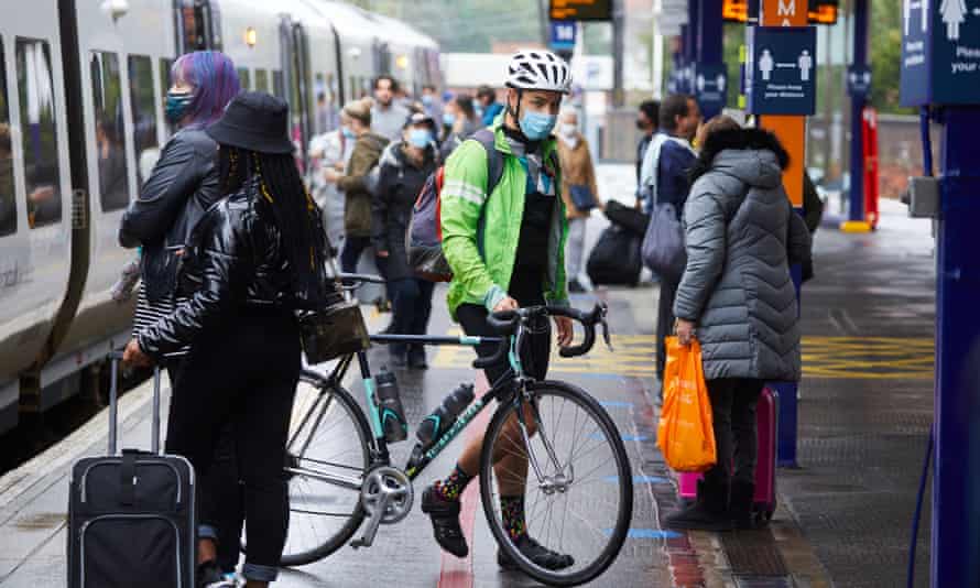 Commuters at Piccadilly station in Manchester.