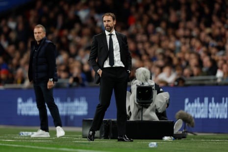 England coach Gareth Southgate watching the match on the sidelines.