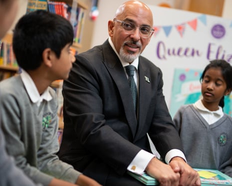 Nadhim Zahawi answers questions from year 5 pupils after reading a commemorative platinum jubilee book during a visit to Manor Park primary school in Sutton, south London
