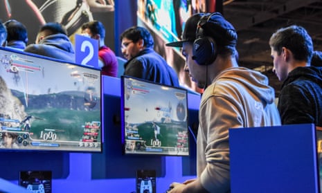 People play video games at Paris Games Week in 2017